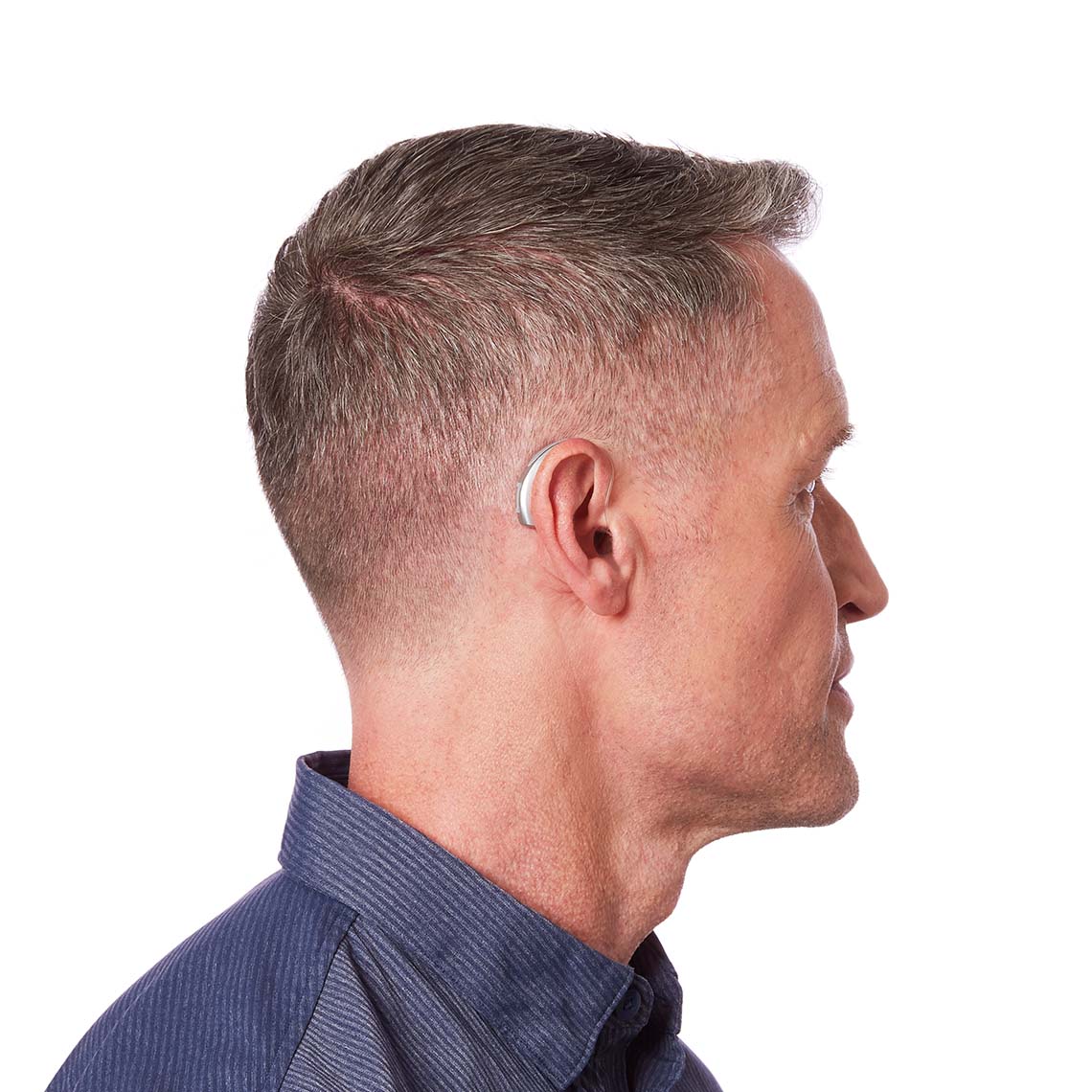 A Power Plus BTE 13 shown on a man's ear
