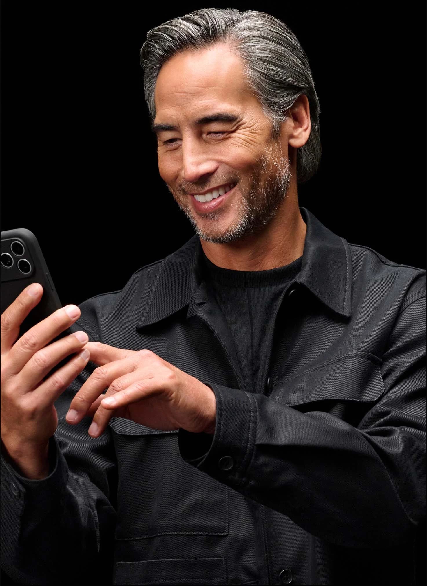 man using a smartphone